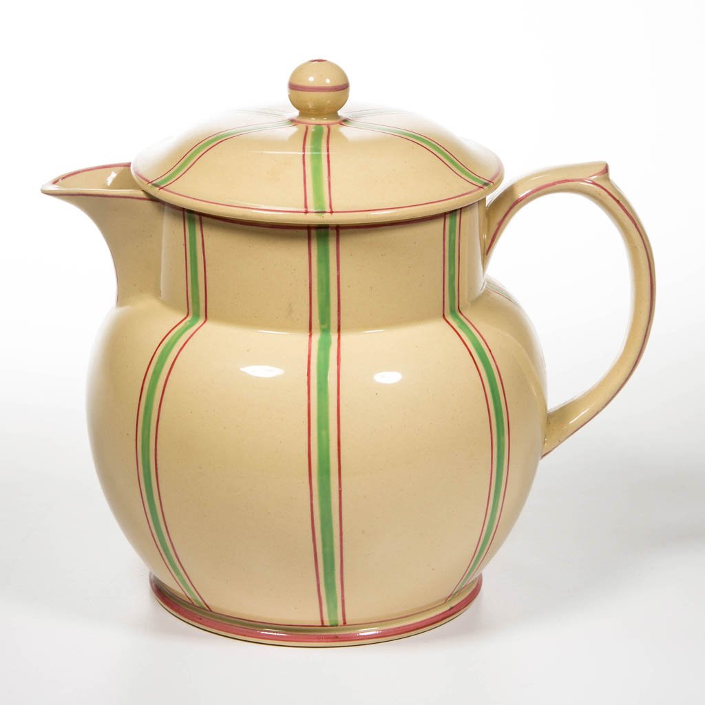 ENGLISH STAFFORDSHIRE POTTERY PEARLWARE COVERED: ENGLISH STAFFORDSHIRE POTTERY PEARLWARE COVERED LEMONADE PITCHER, of Dutch shape, the molded cover with globular knop, dipped in yellow-colored glaze and painted with vertical bands of stripes in red