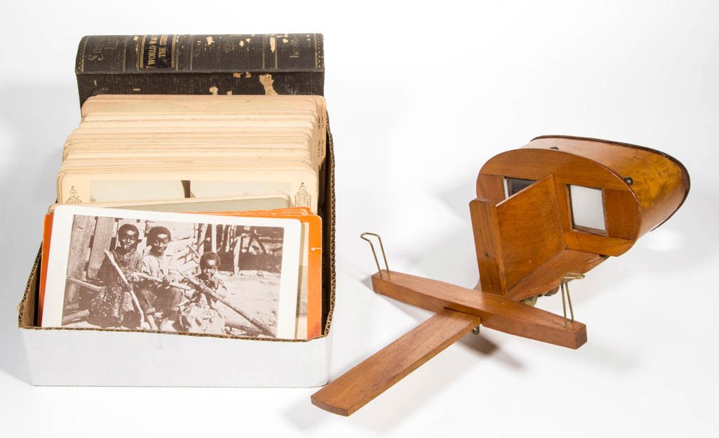 AMERICAN STEREOVIEWER AND CARDS: AMERICAN STEREOVIEWER AND CARDS, viewer marked "The Vistascope" for Griffith & Griffith, Philadelphia. The roughly 124 stereo cards include four oversized published by H. Abercromby bearing various in