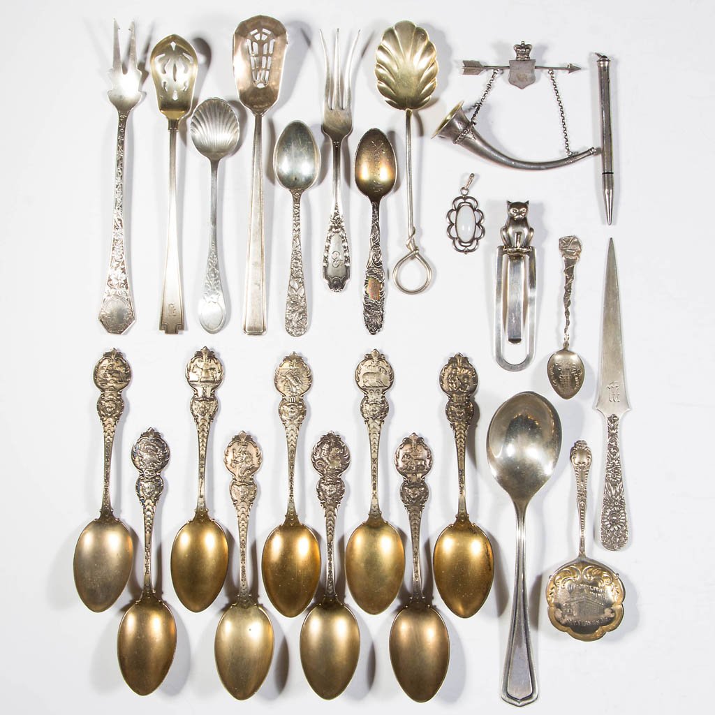 ASSORTED AMERICAN STERLING SILVER FLATWARE AND OTHER: ASSORTED AMERICAN STERLING SILVER FLATWARE AND OTHER ARTICLES, LOT OF 25, including months of the year and souvenier spoons, small serving pieces, and a Kirk Repousse letter opener. Total weight: 10.6