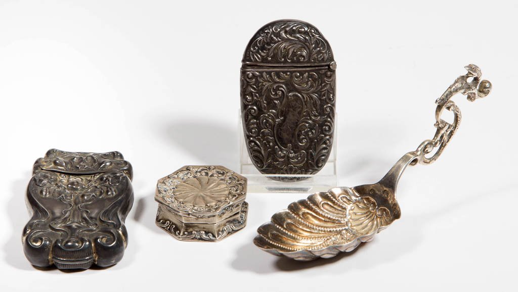 ASSORTED STERLING SILVER ARTICLES, LOT OF FOUR: ASSORTED STERLING SILVER ARTICLES, LOT OF FOUR, comprising one sugar scoop in the shape of a shell with bird's head on handle, one small container engraved "GGM," and two weighted match holders. Total