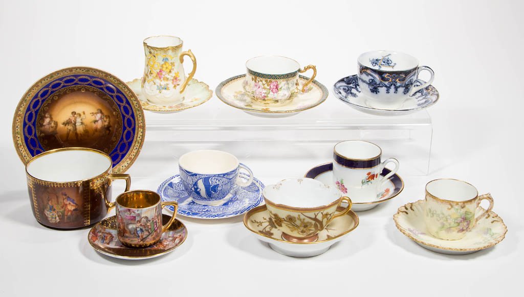 ASSORTED DECORATED DEMITASSE CUP AND SAUCER SETS, LOT: ASSORTED DECORATED DEMITASSE CUP AND SAUCER SETS, LOT OF NINE, including a Vernon Kilns Coral Reef, an Italian Richard Ginoil, a "Czecho-Slowakia" example with a Royal Staffordshire Iris. Late 19th to