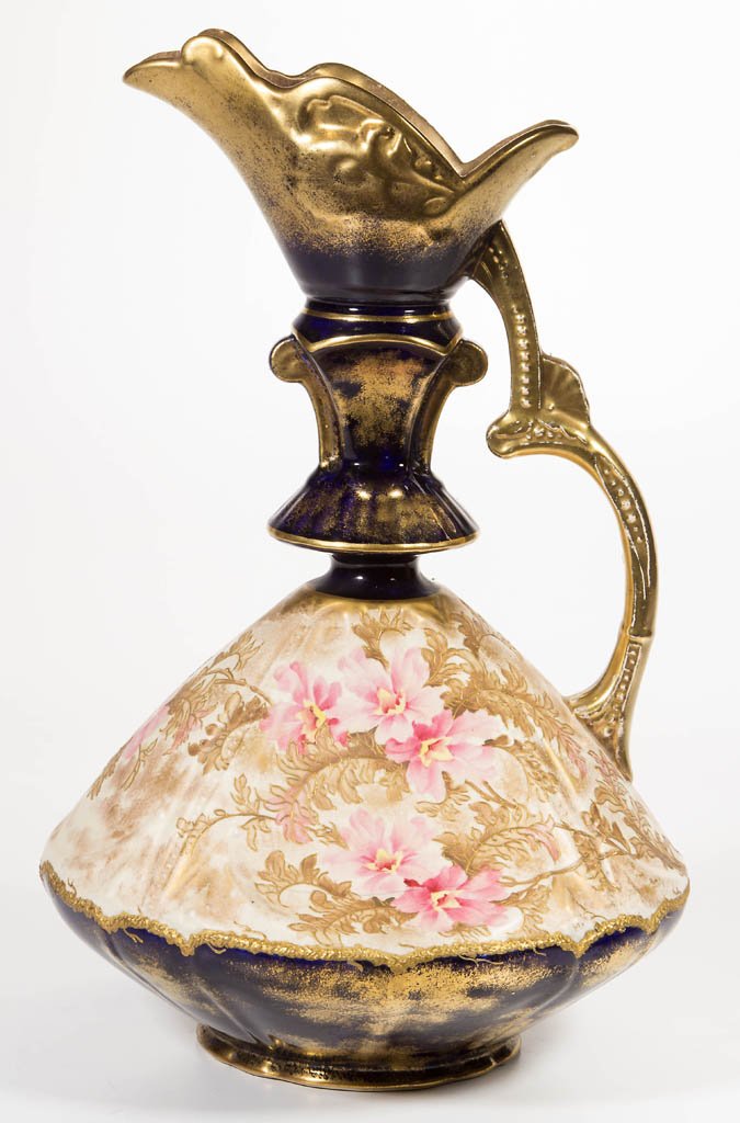 ENGLISH OLD HALL EWER: ENGLISH OLD HALL EWER, the neck and collars, and underside of waist in cobalt blue with gold-painted accents, the double arching handle gold-painted, the body above waist in cream ground, with pink fl