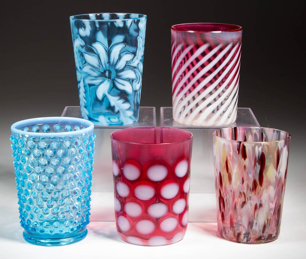 ASSORTED VICTORIAN AND OTHER GLASS TUMBLERS, LOT OF: ASSORTED VICTORIAN AND OTHER GLASS TUMBLERS, LOT OF FIVE, including a blue Poinsettia, rubina Swirled Stripe, and multi-color spatter. First half 20th century. 3 5/8" to 4" H. Provenance: Property of 