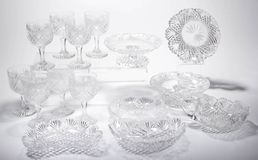 CUT STRAWBERRY DIAMONDS AND FANS TABLE ARTICLES, LOT OF: CUT STRAWBERRY DIAMONDS AND FANS TABLE ARTICLES, LOT OF 15, colorless, comprising eight clarets with notched stems and star-cut feet, two small tazzas with cut strawberry diamond feet, one bon-bon wit