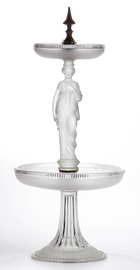 SANDWICH FROSTED MADONNA EPERGNE: SANDWICH FROSTED MADONNA EPERGNE, colorless and frosted, figural Madonna stem centering upper and lower Beaded Top shallow bowls, plastered into a ribbed beaded-edge standard, non-original brass screw