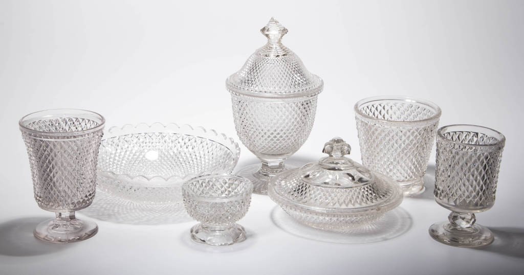ASSORTED DIAMOND POINT / SHARP DIAMOND (OMN) TABLE: ASSORTED DIAMOND POINT / SHARP DIAMOND (OMN) TABLE ARTICLES, LOT OF SEVEN, colorless lead glass, including a butter dish, covered sugar, and waist bowl. New England Glass Co. and others. Circa 1850-18