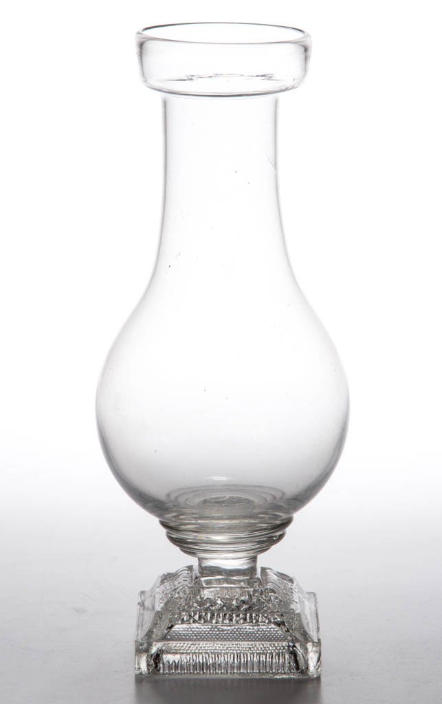FREE-BLOWN AND PRESSED LACY HYACINTH VASE: FREE-BLOWN AND PRESSED LACY HYACINTH VASE, colorless, baluster-form bowl with galleried rim, raised on a square single-step base with a narrow band of leaves on the upper step, and fine diamonds, pris