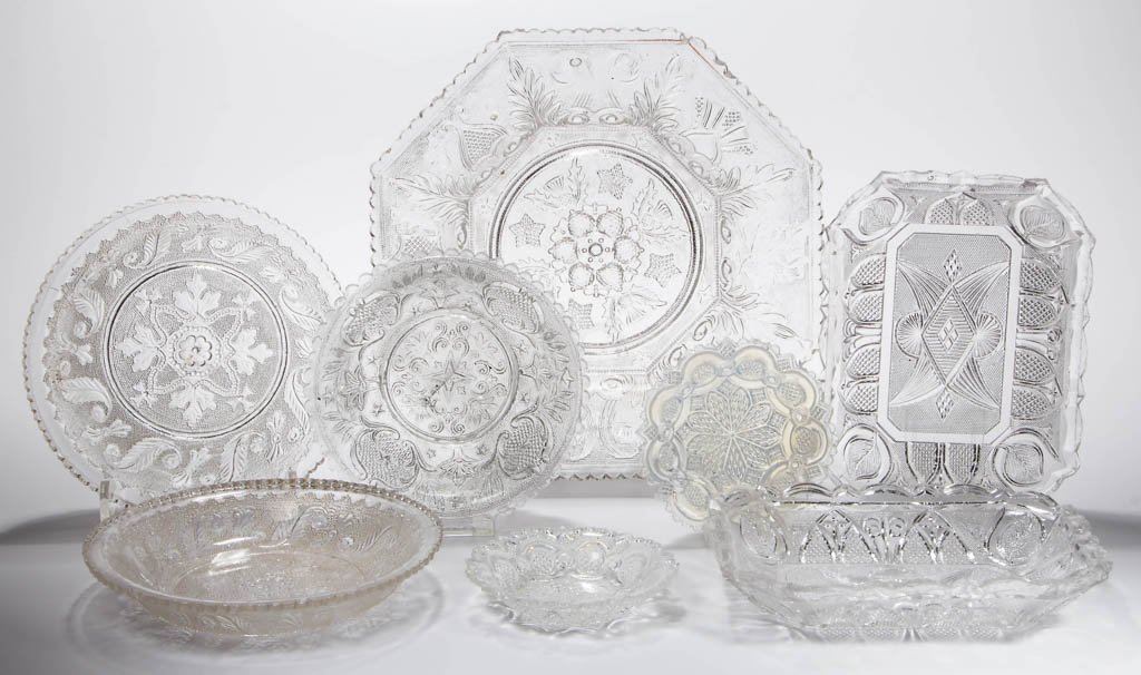 ASSORTED PRESSED LACY TABLE ARTICLES, LOT OF EIGHT: ASSORTED PRESSED LACY TABLE ARTICLES, LOT OF EIGHT, two opalescent, the remainder colorless, including two Leaf and Gothic Arch variant rectangular dishes. Boston & Sandwich Glass Co. and others. Circ