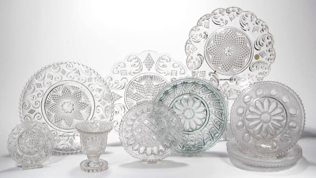 ASSORTED PRESSED LACY AND OTHER ARTICLES, LOT OF TEN: ASSORTED PRESSED LACY AND OTHER ARTICLES, LOT OF TEN, light green and colorless, including a Daisy and Peacock Feather nappie, three Daisy and Ovals plates with moonstone tint, and an Acanthus Leaf eg