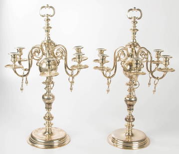 SHEFFIELD STERLING SILVER PAIR OF MONUMENTAL CANDELABRA: SHEFFIELD STERLING SILVER PAIR OF MONUMENTAL CANDELABRA, each boldly shaped stem supporting six scrolling arms, each with a hanging pendant, surmounted by a double C-scroll finial, the whole raised on