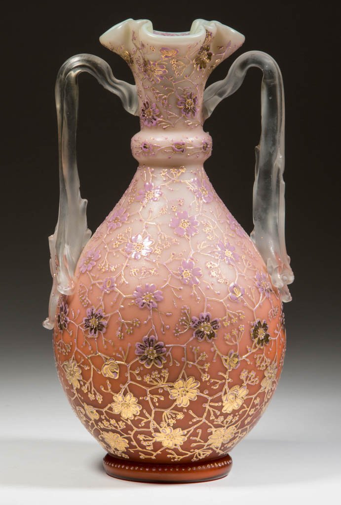 VICTORIAN CASED GLASS VASE WITH OREGON RETAILER'S: VICTORIAN CASED GLASS VASE WITH OREGON RETAILER'S LABELS, opal-cased shaded burnt sienna, gilt-floral decoration to body, applied thorn handles, polished pontil mark. Base with two labels for Olds & S