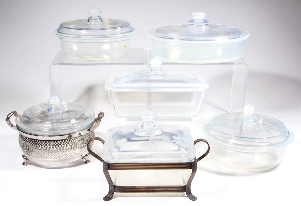 ASSORTED FRY EMBOSSED GRAPE OVENWARE ARTICLES, LOT OF: ASSORTED FRY EMBOSSED GRAPE OVENWARE ARTICLES, LOT OF SIX, opalescent, including two shape #1938 casseroles, one which is in a metal holder, a shape #1928 meatloaf, and a shape #1951 oval casserole. H