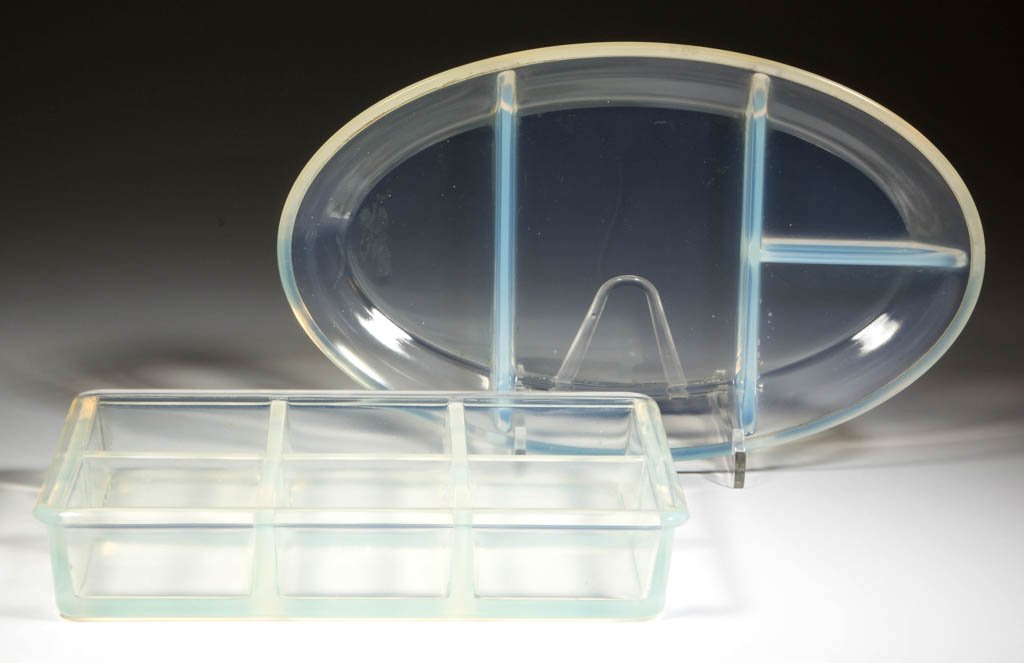 FRY KITCHENWARE ARTICLES, LOT OF TWO: FRY KITCHENWARE ARTICLES, LOT OF TWO, opalescent, comprising a muffin pan and a divided relish dish. H. C. Fry Glass Co. First half 20th century. Muffin 9 1/4" x 6 1/2", relish 11 1/4" x 7". Literatur