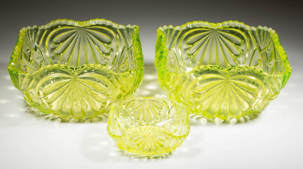 HOBBS NO. 102 / MALTESE AND RIBBONS TABLE ARTICLES, LOT: HOBBS NO. 102 / MALTESE AND RIBBONS TABLE ARTICLES, LOT OF THREE, Canary/Vaseline (uranium), comprising two bowls and a sauce dish. Hobbs, Brockunier & Co. Circa 1885-1891. 1 5/8" to 3 5/8" H, 4" to 7