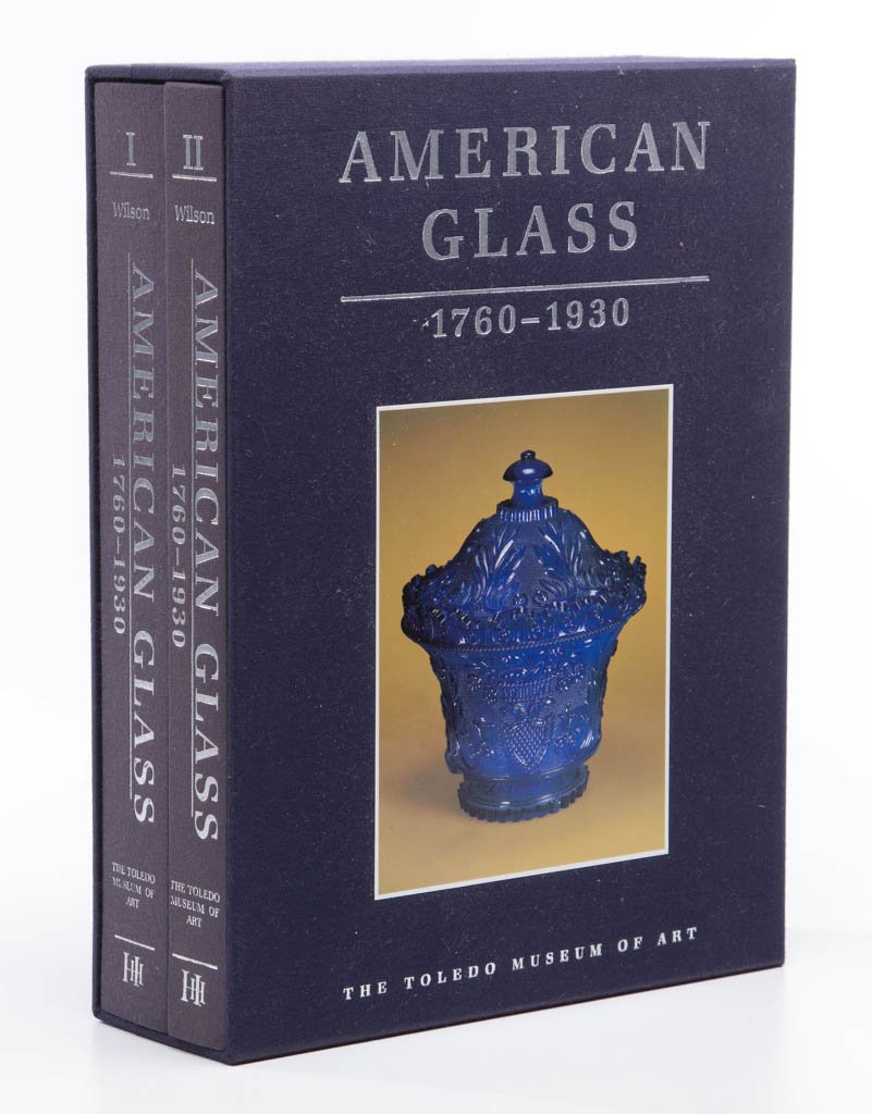 AMERICAN GLASS REFERENCE TWO-VOLUME SET: AMERICAN GLASS REFERENCE TWO-VOLUME SET, Kenneth M. Wilson, "American Glass: 1760-1930," first edition, 1994, The Toledo Museum of Art. Hard cover, in slipcase. Provenance: From the collection of the 