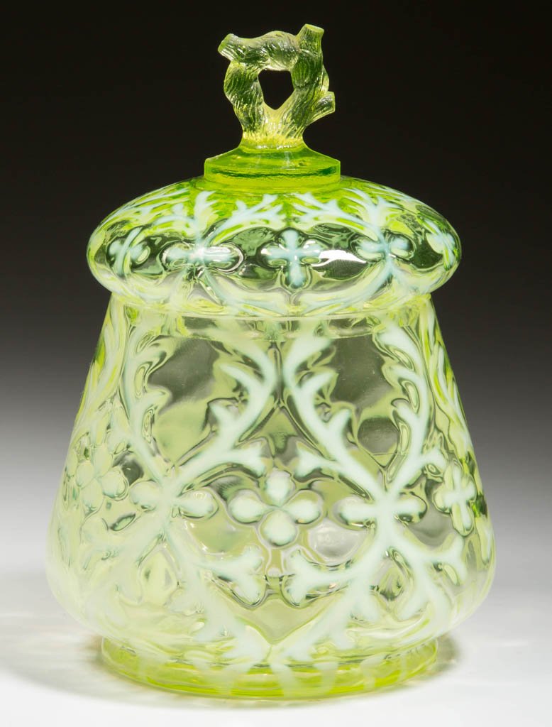 OPALINE BROCADE / SPANISH LACE COVERED SUGAR: OPALINE BROCADE / SPANISH LACE COVERED SUGAR, Vaseline (uranium) opalescent, Vaseline (uranium) branch finial, factory-polished base and cover rims. Northwood Glass Co. Circa 1899. 6 1/8" HOA.Literatu
