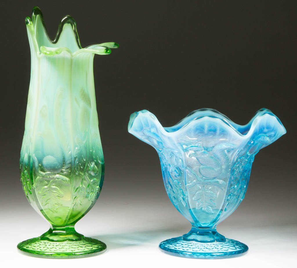 SQUIRREL AND ACORN WHIMSY ARTICLES, LOT OF TWO: SQUIRREL AND ACORN WHIMSY ARTICLES, LOT OF TWO, comprising a blue opalescent vase with gauffered six-scallop rim, and a green opalescent jack-in-the-pulpit vase with six-petal rim, each raised on a ci