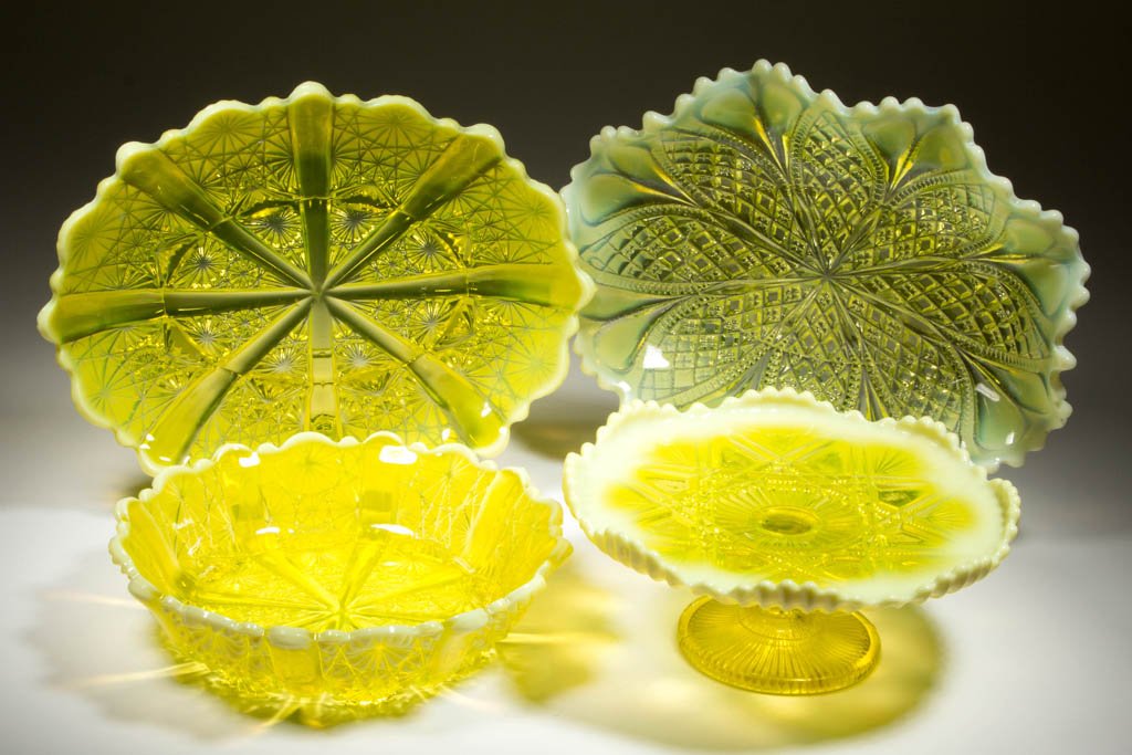ASSORTED DAVIDSON PEARLINE ARTICLES, LOT OF FOUR: ASSORTED DAVIDSON PEARLINE ARTICLES, LOT OF FOUR, Vaseline (uranium) opalescent, comprising a Lady Chippendale bowl and plate, a Victoria and Albert compote, and a William and Mary crimped dish. Geo. 