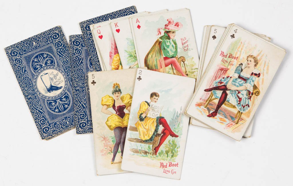 RED BOOT LONG CUT TOBACCO PLAYING CARDS, LOT OF 40: RED BOOT LONG CUT TOBACCO PLAYING CARDS, LOT OF 40, each featuring a color lithograph of a lady, some in a suggestive pose, blue backs with company logo. Late 19th century. 3 7/8" x 2 1/4". Provenance