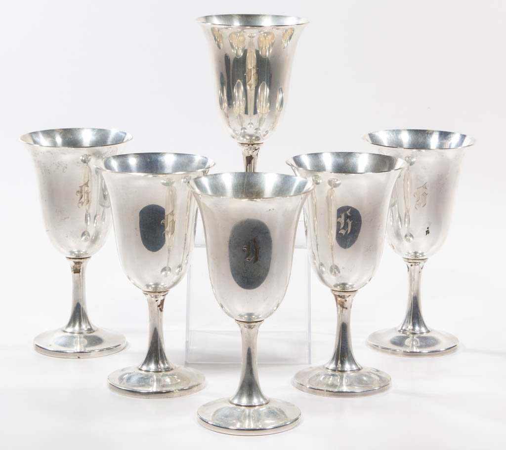 AMERICAN STERLING SILVER GOBLETS, SET OF SIX: AMERICAN STERLING SILVER GOBLETS, SET OF SIX, with flared rim, on circular foot, with "H" monogram, marked "WALLACE / STERLING" for Wallace Silversmiths, Inc. Total weight: 34.625 ozt. 20th century. 6