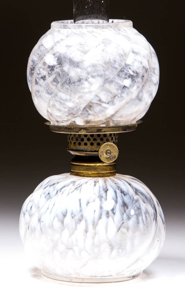 SMITH I, FIG. 294 / PARIAN SWIRL MINIATURE LAMP: SMITH I, FIG. 294 / PARIAN SWIRL MINIATURE LAMP, colorless with opal spatter, matching patterned ball-form shade. Fitted with a period slip burner and colorless chimney. Northwood Glass Co. Pattern in