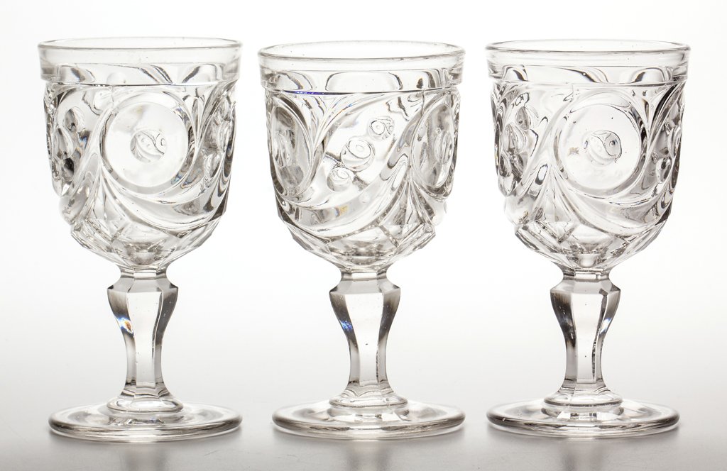 COMET GOBLETS, LOT OF THREE: COMET GOBLETS, LOT OF THREE, colorless lead glass, all large examples, each having a polished pontil mark. Boston & Sandwich Glass Co. Circa 1860s. 6 1/4" to 6 3/8" H. Literature: B & K I, fig. 1118. 