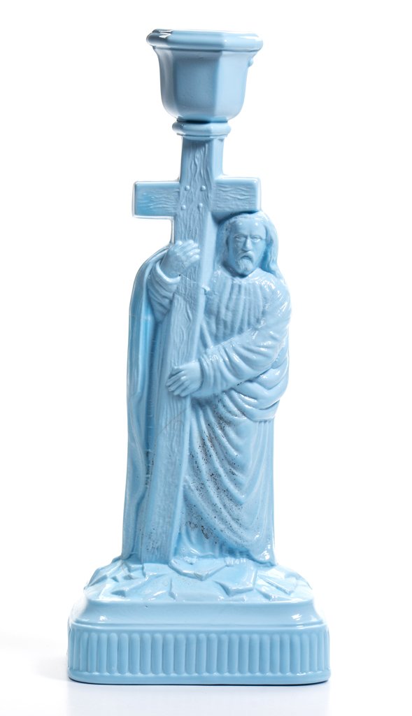 CHALLINOR CRUCIFIX CANDLESTICK: CHALLINOR CRUCIFIX CANDLESTICK, opaque soft blue. Challinor, Taylor & Co. Circa 1884-1891. 10 1/2" H, 3 1/4" x 4 1/4".Literature: Lucas - Tarentum Pattern Glass, p. 107. Felt/Stoer - The Glass Candles