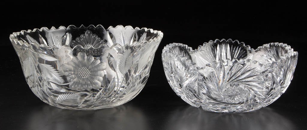 ASSORTED CUT GLASS BOWLS, LOT OF TWO: ASSORTED CUT GLASS BOWLS, LOT OF TWO, colorless lead glass, comprising a floral design, possibly Pairpoint, and a pinwheel and buzz cut designed example. Fourth quarter 19th century. 3 1/2" and 4 1/4"