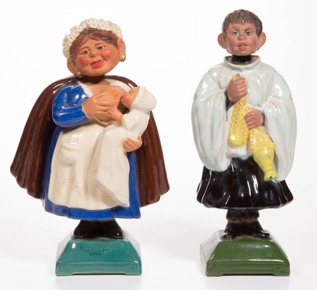 PORTUGUESE TERRACOTTA STANDING NODDERS, LOT OF TWO: PORTUGUESE TERRACOTTA STANDING NODDERS, LOT OF TWO, the first, in the form of an altar boy, and the second in the form of a wet nurse, both painted in polychrome enamels. Head and body both nod. Vario