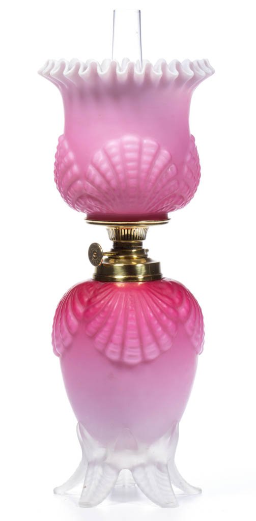 SHELL EMBOSSED CASED GLASS MINIATURE LAMP: SHELL EMBOSSED CASED GLASS MINIATURE LAMP, shaded dark to light rose with satin finish, large shells pattern to an urn-form font, applied colorless leaf-form base with five legs and satin finish, matc