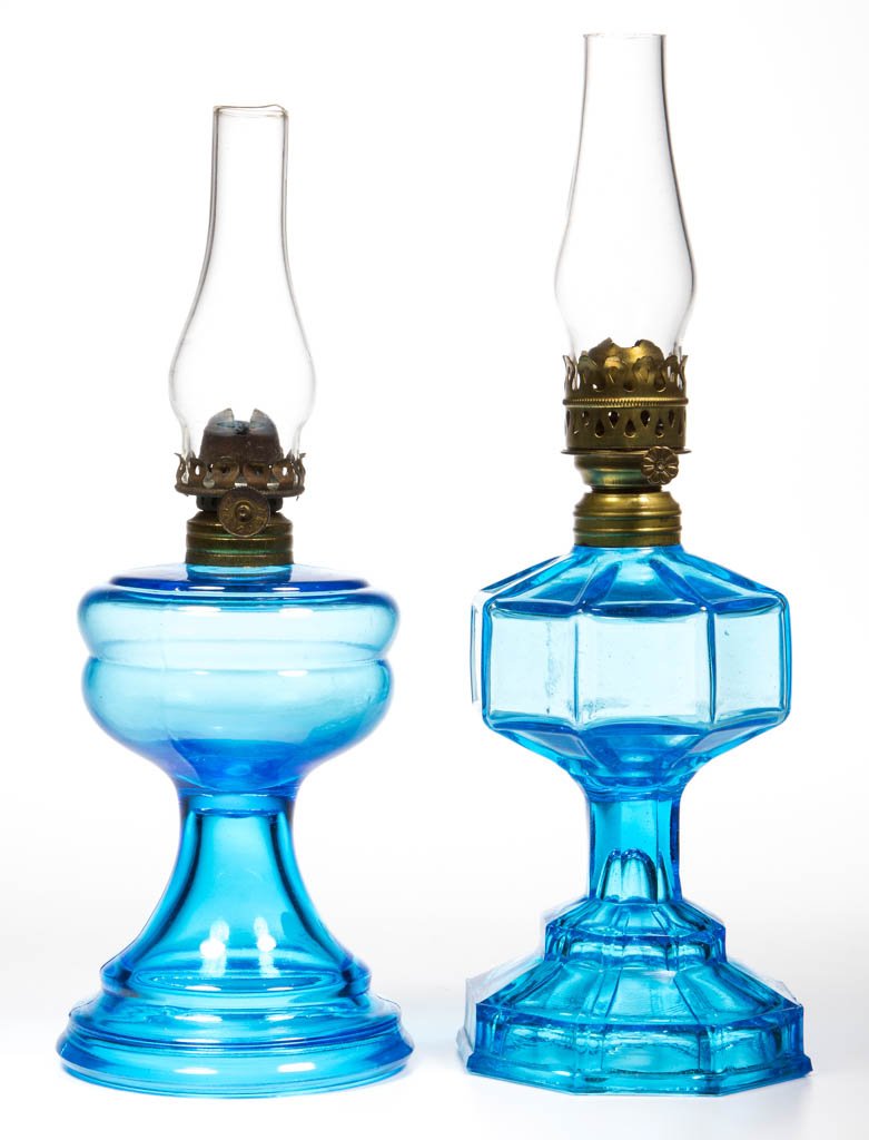 ASSORTED PATTERN MINIATURE STAND LAMPS, LOT OF TWO: ASSORTED PATTERN MINIATURE STAND LAMPS, LOT OF TWO, blue, comprising Octavia and a ringed shoulder example, period collars. Each fitted with a period burner, colorless chimneys. Fourth quarter 19th/fi
