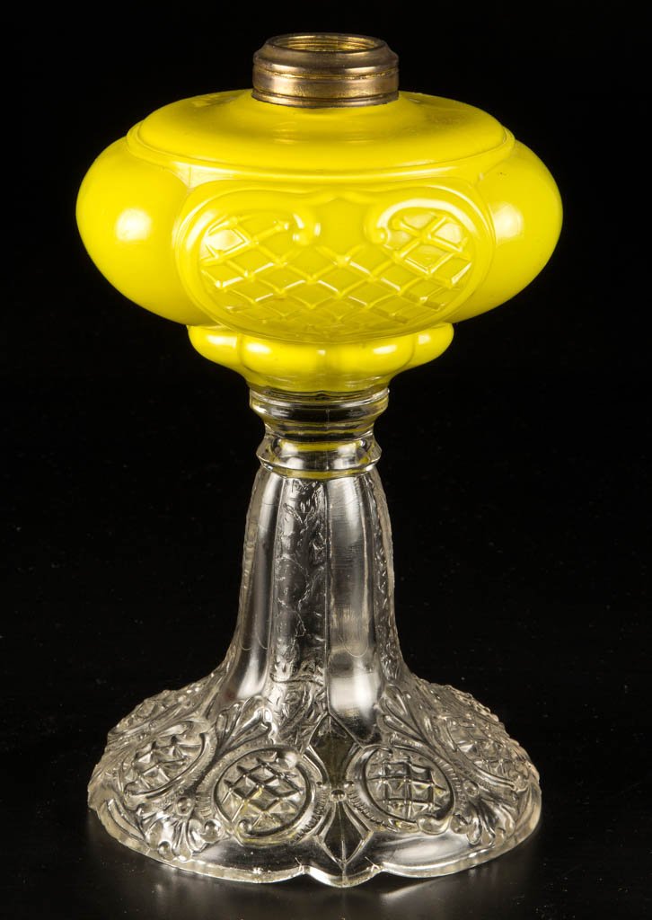 PRINCE EDWARD KEROSENE STAND LAMP: PRINCE EDWARD KEROSENE STAND LAMP, cased lemon yellow font, colorless base, No. 2 Taplin-Brown collar. Late 19th/early 20th century. 9 3/4" H to top of collar, 5 3/4" D foot. Literature: Parallels Thu