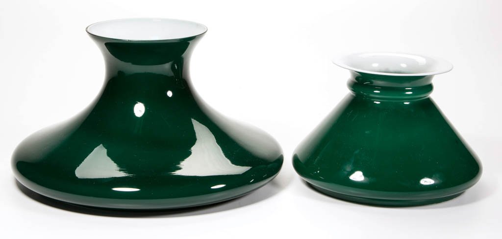 EMERALITE CASED STUDENT LAMP SHADES, LOT OF TWO: EMERALITE CASED STUDENT LAMP SHADES, LOT OF TWO, cased teal green, comprising one tapered and one Tam O' Shanter form example. First half 20th century. 5 3/8" and 6 3/4" H, 6 7/8" and 9 7/8" D fitters