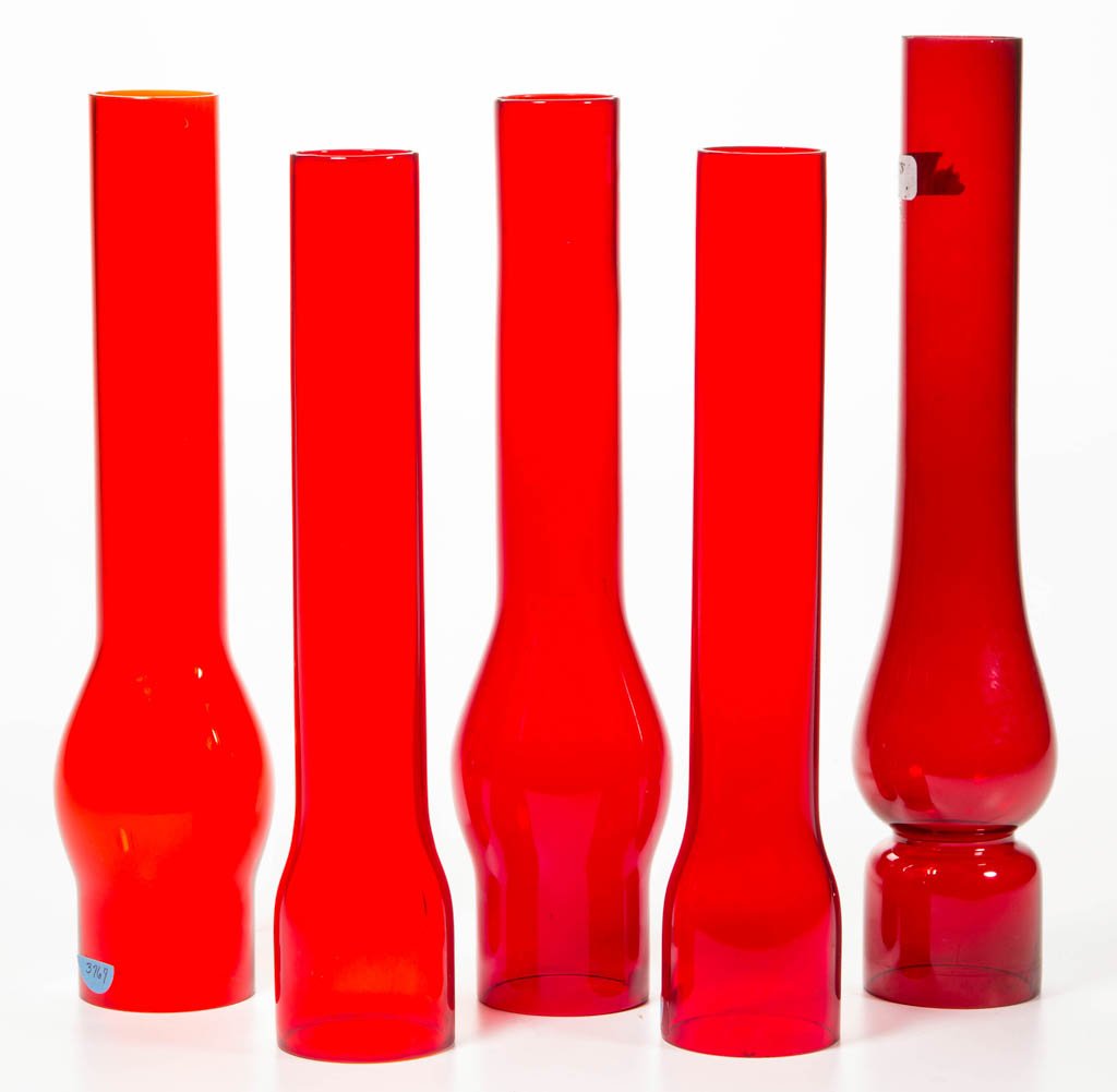 RUBY NO. 0 SLIP CHIMNEYS, LOT OF FIVE: RUBY NO. 0 SLIP CHIMNEYS, LOT OF FIVE, including two bulbous examples, one signed, "McKee Glass Co," another signed, "Macbeth Pearl Glass/954." Fourth quarter 19th century. 9 1/4" and 9 1/2" H.Provena