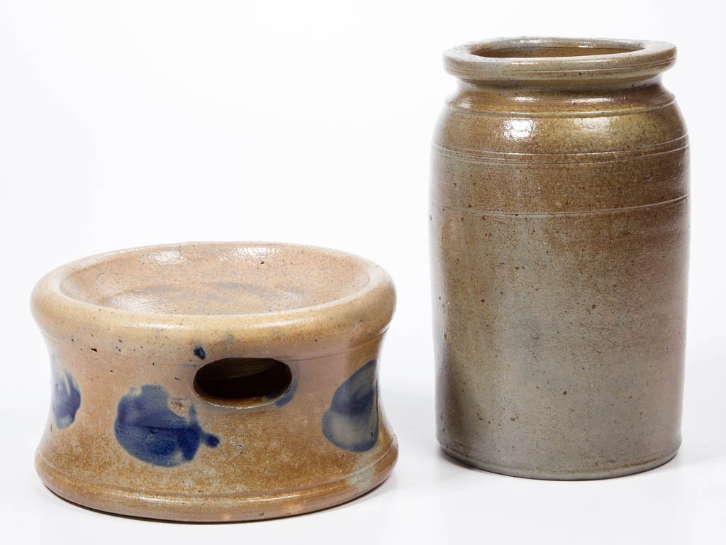 MID-ATLANTIC STONEWARE VESSELS, LOT OF TWO: MID-ATLANTIC STONEWARE VESSELS, LOT OF TWO, salt-glazed, comprising a spittoon with rounded foot and six brushed cobalt leaves around the body, and an approximately one-quart capacity jar with incised
