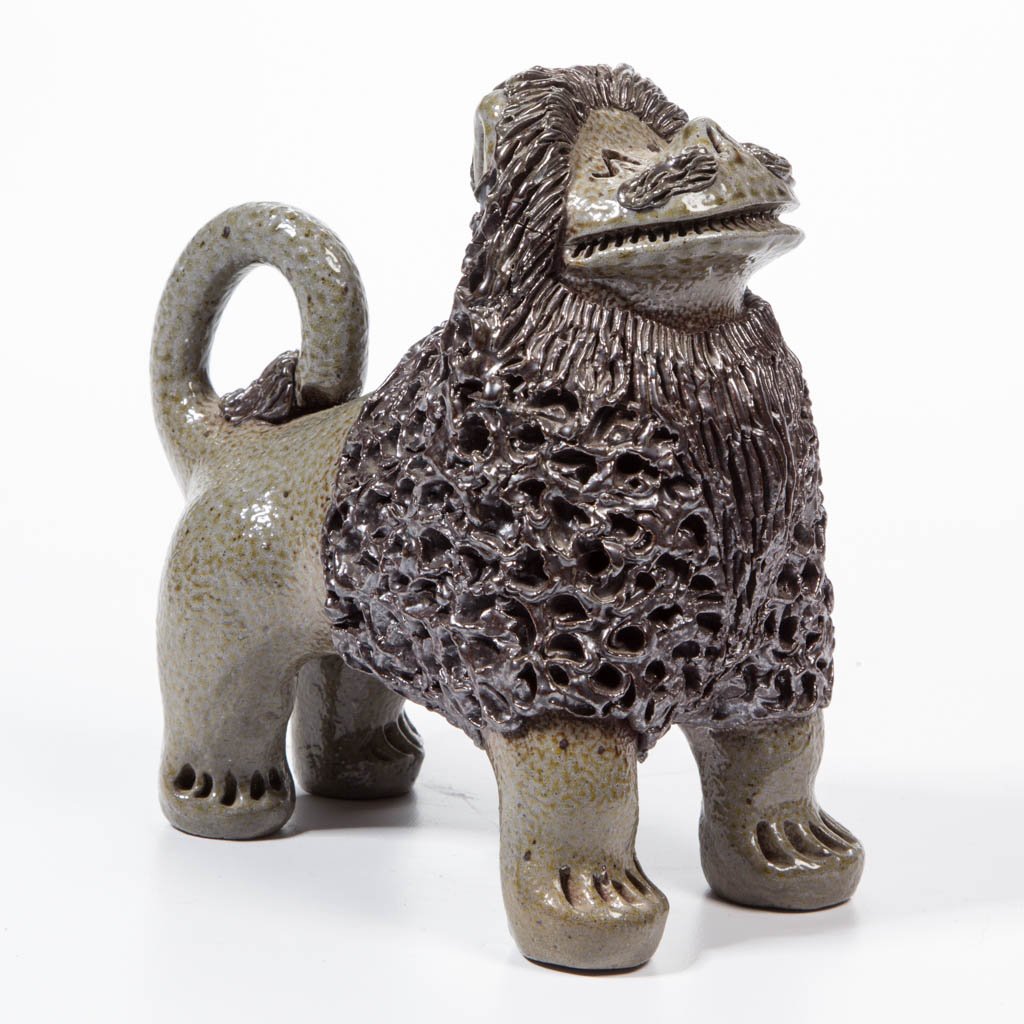 BILLY RAY HUSSEY / OWENS NORTH CAROLINA STONEWARE FOLK: BILLY RAY HUSSEY / OWENS NORTH CAROLINA STONEWARE FOLK POTTERY LION, salt-glazed, standing figure with textured fur and beard, mustache, and end of tail, inscribed "Owens / BH" underneath. Billy Ray H