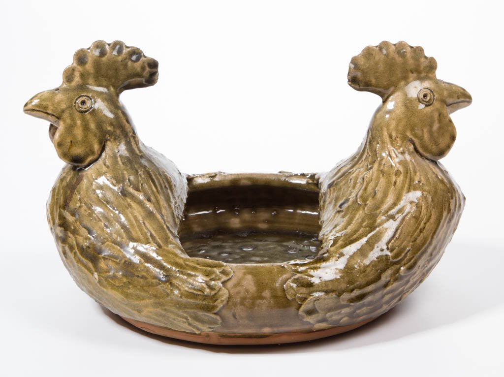 SIGNED "JOHN MEADERS" CLEVELAND, GEORGIA FOLK POTTERY: SIGNED "JOHN MEADERS" CLEVELAND, GEORGIA FOLK POTTERY BOWL, medium-green-glazed, rooster head on two sides, incised script two-line signature and "MLM" and "24/4" monogram under base. John Rufus Meade