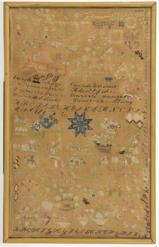 CONTINENTAL, PROBABLY SPANISH, PICTORIAL NEEDLEWORK: CONTINENTAL, PROBABLY SPANISH, PICTORIAL NEEDLEWORK SAMPLER, silk on linen, brief verse (in Spanish) at center surrounded by various pictorial devices including cats, dogs, birds, flowers, hearts, bas