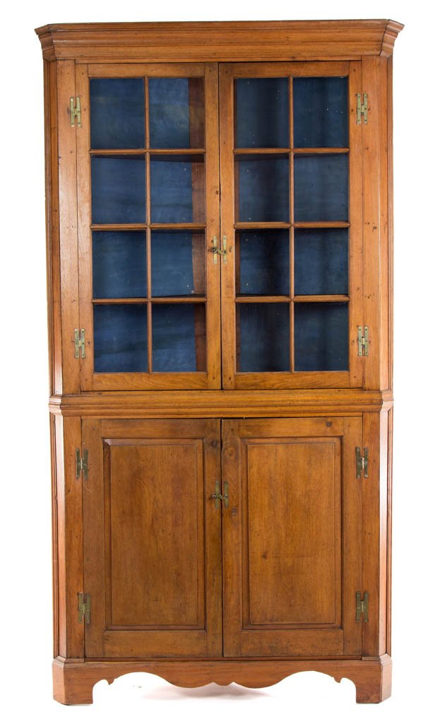 PIEDMONT NORTH CAROLINA CHIPPENDALE WALNUT CORNER: PIEDMONT NORTH CAROLINA CHIPPENDALE WALNUT CORNER CUPBOARD, probably a built-in example, the upper case with applied molded cornice over two hinged eight-light doors, applied waist molding, lower case