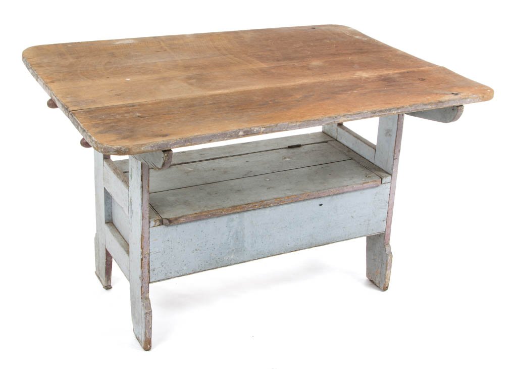 PENNSYLVANIA PAINTED PINE HUTCH / BENCH TABLE: PENNSYLVANIA PAINTED PINE HUTCH / BENCH TABLE, removable four-board scrub top raised on a base with hinged lid concealing a storage well, raised on simple cut-out feet, original pins. Old dry gray-pai