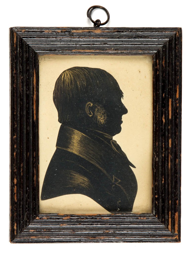 AMERICAN OR BRITISH SCHOOL (19TH CENTURY) FOLK ART: AMERICAN OR BRITISH SCHOOL (19TH CENTURY) FOLK ART MINIATURE PORTRAIT OF A GENTLEMAN, in the manner of a bust-length silhouette with watercolor highlights, sitter in profile sporting high collar, crav