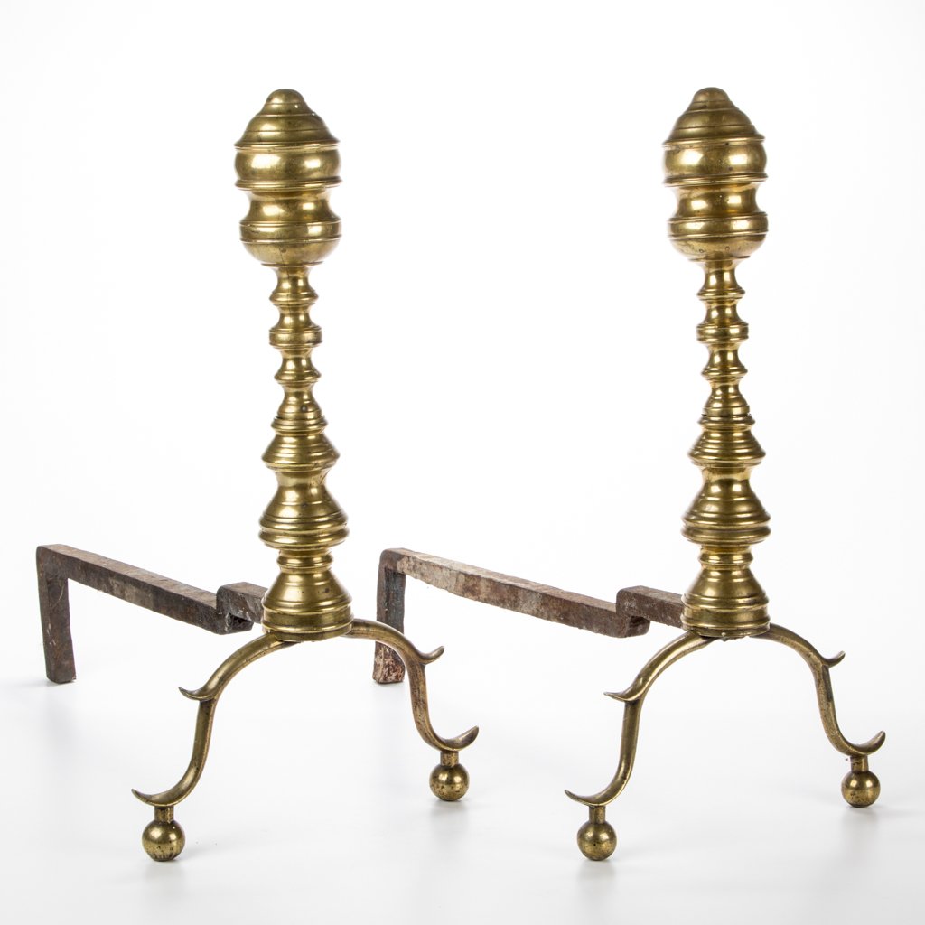PAIR OF AMERICAN CLASSICAL BRASS ANDIRONS: PAIR OF AMERICAN CLASSICAL BRASS ANDIRONS, each ring-turned finial and shaft raised on spurred cabrole legs and ball feet, originial log supports. Circa 1830. 18" HOA, 16 1/2" D. Provenance: From a Ne
