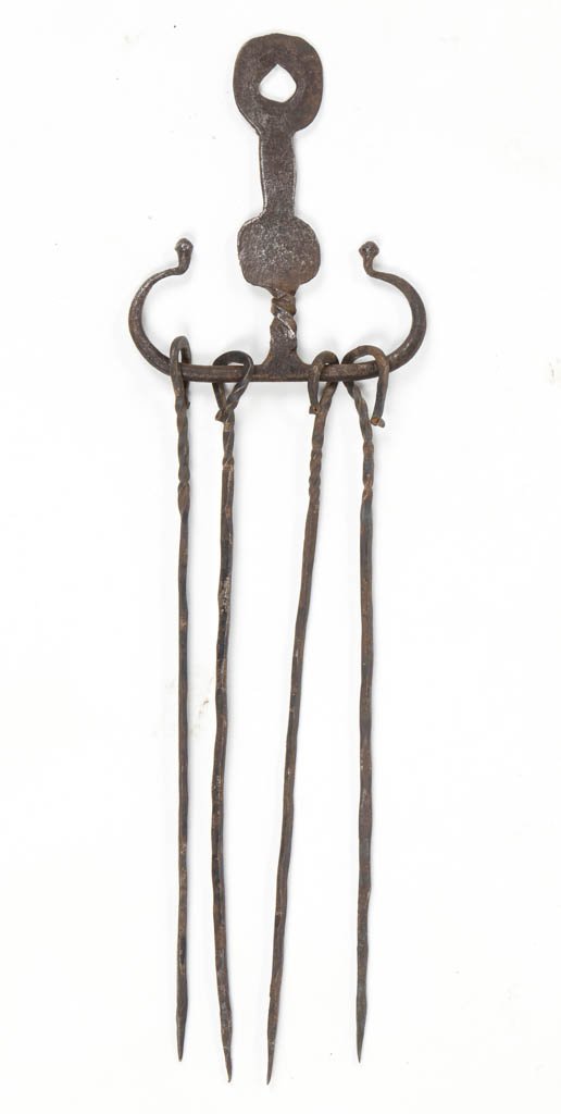 AMERICAN WROUGHT-IRON HANGING SKEWER RACK AND SKEWERS: AMERICAN WROUGHT-IRON HANGING SKEWER RACK AND SKEWERS, rack with upper hanging hole, decorative twist, and steer-horn arms with acorn finials, fitted with four shepherd-crook skewers. Rack Second half