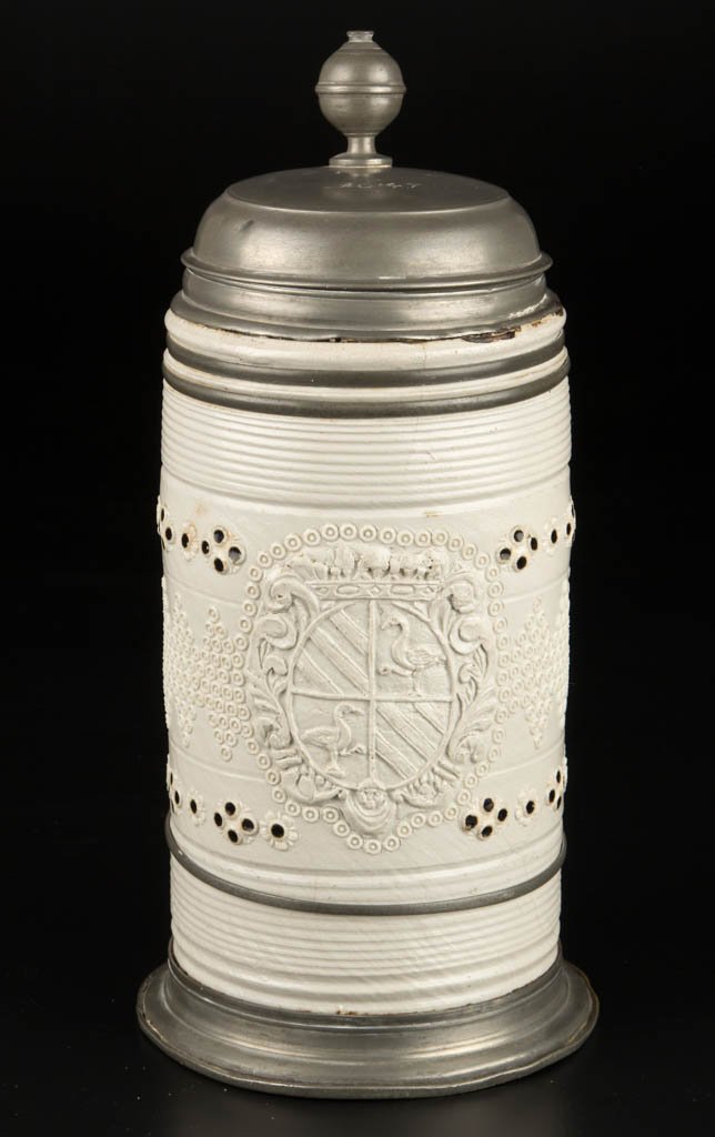GERMAN SALT-GLAZED STONEWARE PEWTER MOUNTED TANKARD: GERMAN SALT-GLAZED STONEWARE PEWTER MOUNTED TANKARD STEIN, the cylindrical form molded with ribs and concentric bands above a wide panel molded in low relief with stylized floral motifs and geometric 