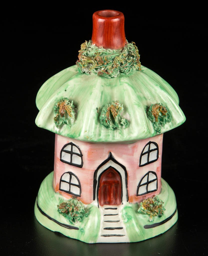 ENGLISH KENT POTTERY STAFFORDSHIRE COTTAGE INCENSE: ENGLISH KENT POTTERY STAFFORDSHIRE COTTAGE INCENSE BURNER, of panel-molded form with green umbrella-style roof with red central pipe-form chimney, encrusted with dried clay "grass" to roof, and before