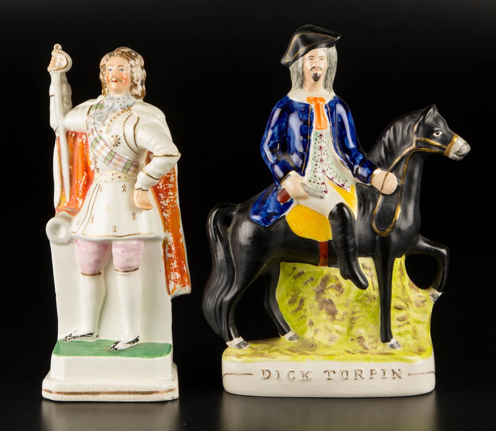 ENGLISH STAFFORDSHIRE POTTERY FIGURES OF DICK TURPIN: ENGLISH STAFFORDSHIRE POTTERY FIGURES OF DICK TURPIN AND ADMIRAL BLAKE, LOT OF TWO, the Turpin figure astride a black horse, supported by a green mound atop the oval base, and the figure of Admiral Ro
