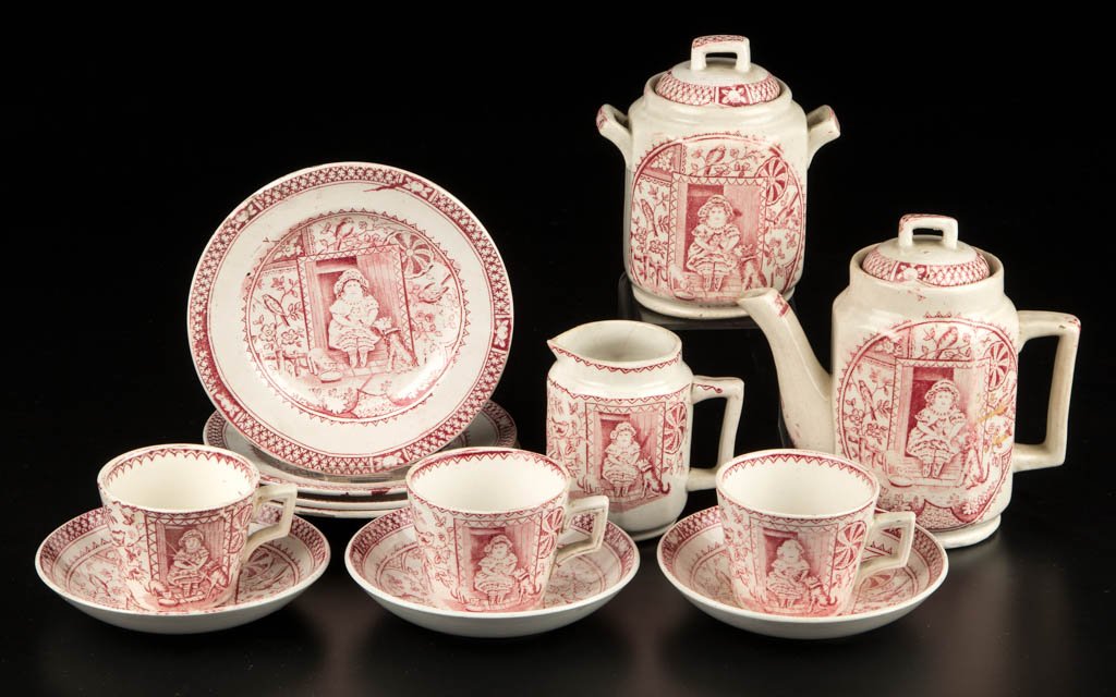 ENGLISH CHARLES ALLERTON IRONSTONE TRANSFERWARE: ENGLISH CHARLES ALLERTON IRONSTONE TRANSFERWARE CHILDREN'S TEA SET, LOT OF 13, printed in red, including a teapot, covered sugar bowl, creamer, three cup and saucer sets, and four 5 3/8" D plates, oct