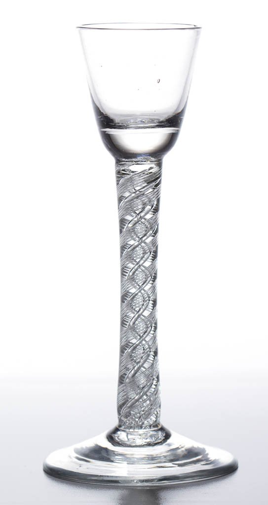 ENGLISH FREE-BLOWN AIR-TWIST STEM WINE GLASS: ENGLISH FREE-BLOWN AIR-TWIST STEM WINE GLASS, colorless lead glass, round funnel bowl with solid base, raised on a stem containing a five-ply spiral band outside a pair of spiral cables, conical foot 