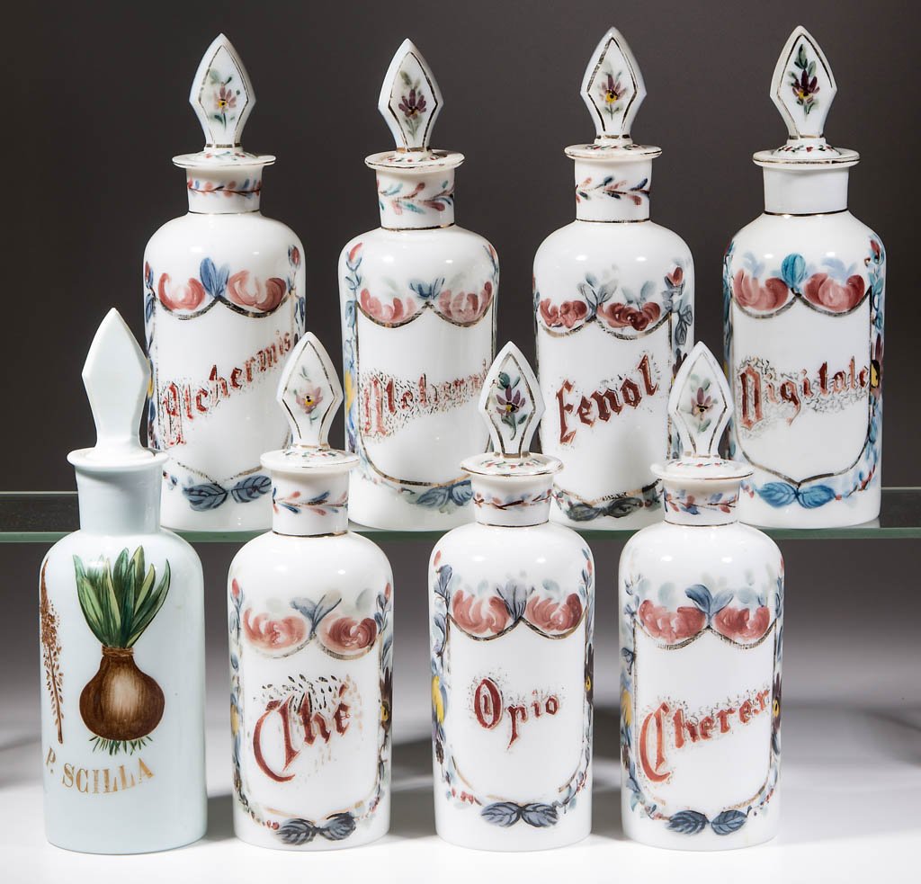 CONTINENTAL WHITE-GLASS DECANTERS, SET OF SEVEN (1 of 1)