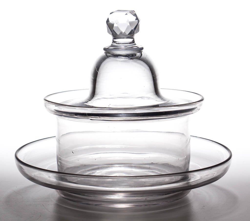 ENGLISH FREE-BLOWN BUTTER COOLER / TUB WITH COVER AND: ENGLISH FREE-BLOWN BUTTER COOLER / TUB WITH COVER AND STAND, colorless lead glass, truncated cylindrical form with galleried rim, domed cover with applied facet-cut finial, and shallow ogee-form stand